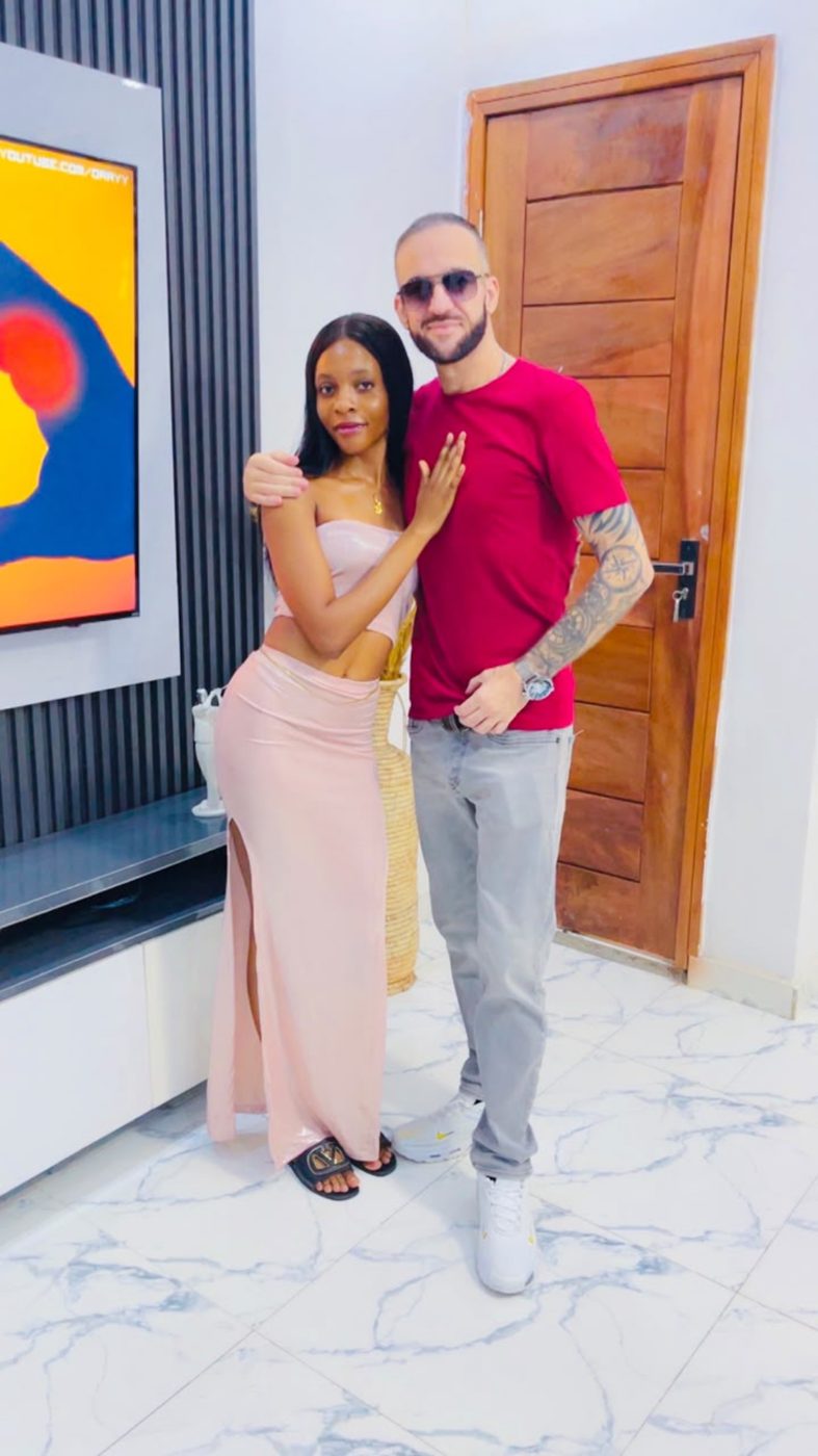Sandra Aina with her fiancé, sharing a moment together